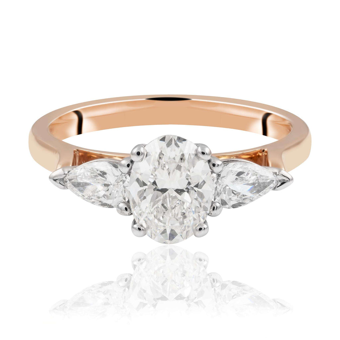 Oval Cut Diamond with pear Cut Diamond Ring