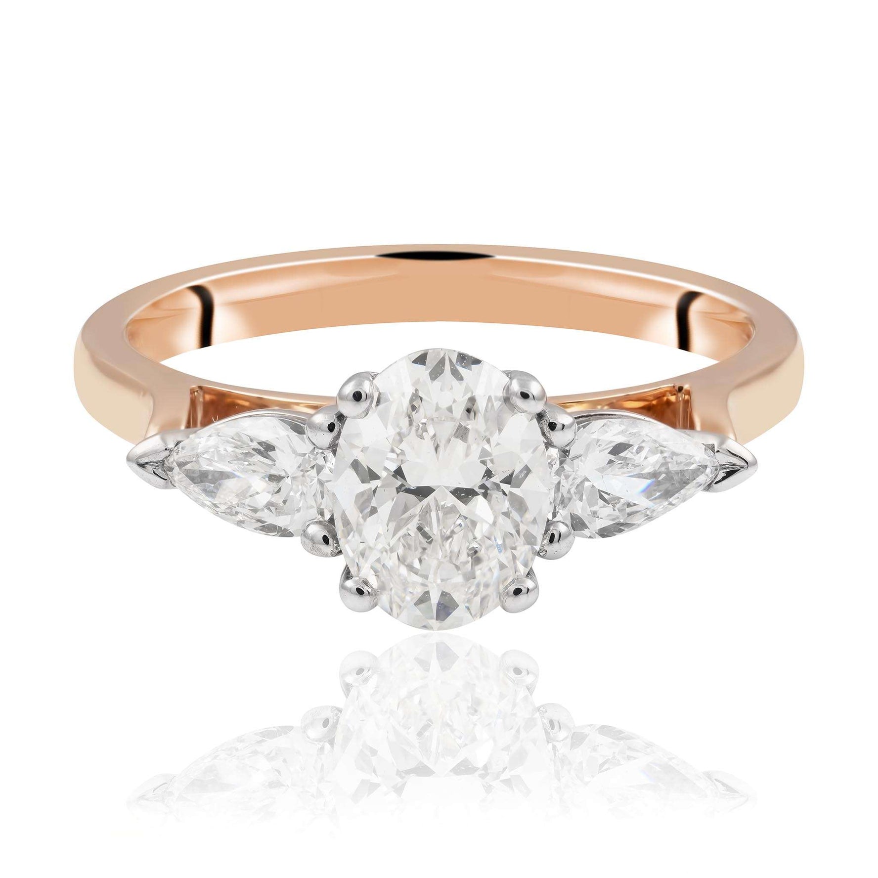 Oval Cut Diamond with pear Cut Diamond Ring