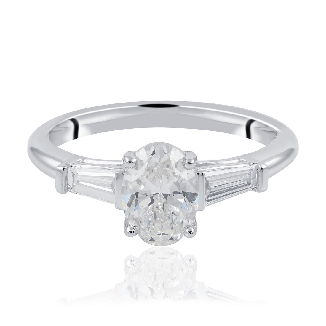 Oval cut and tampered baguette diamond engagement ring