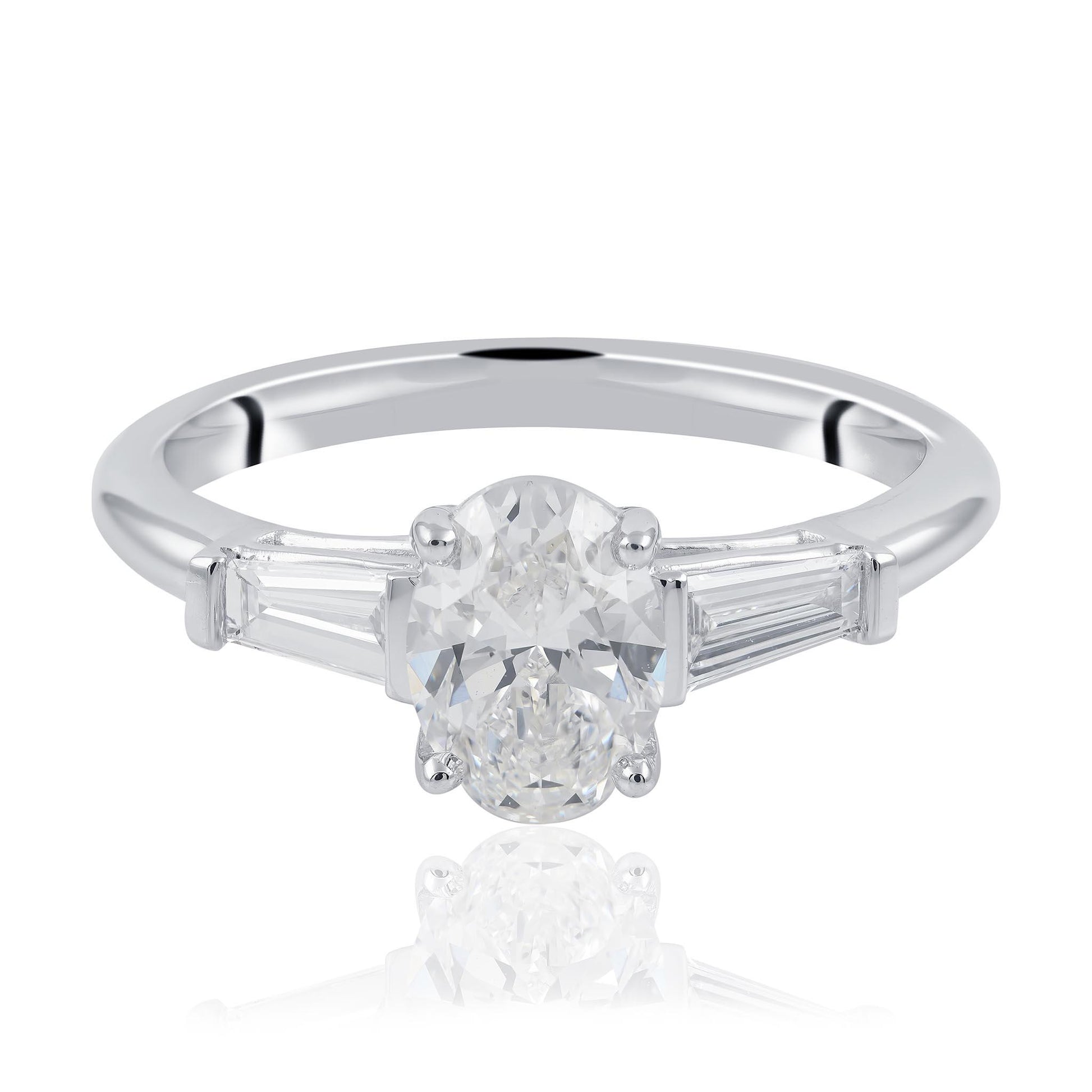 Oval cut and tampered baguette diamond engagement ring