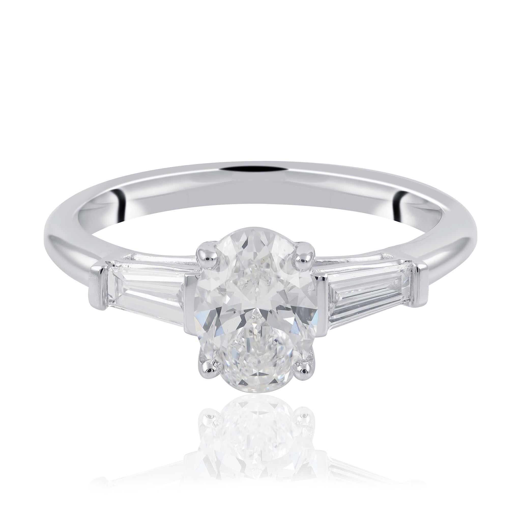 Oval cut and tampered baguette diamond engagement ring