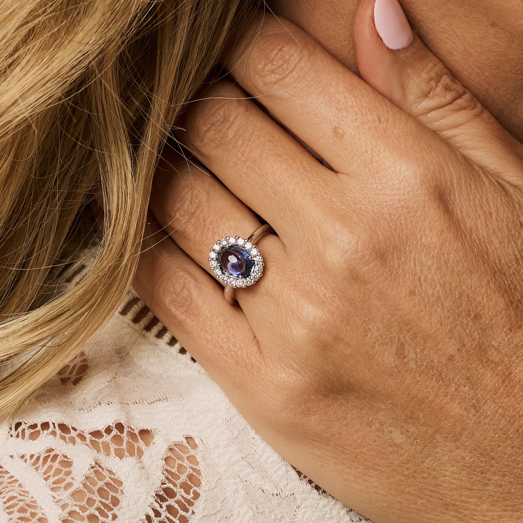 Cabochon-Cut Ceylon Sapphire and Diamond Halo Ring