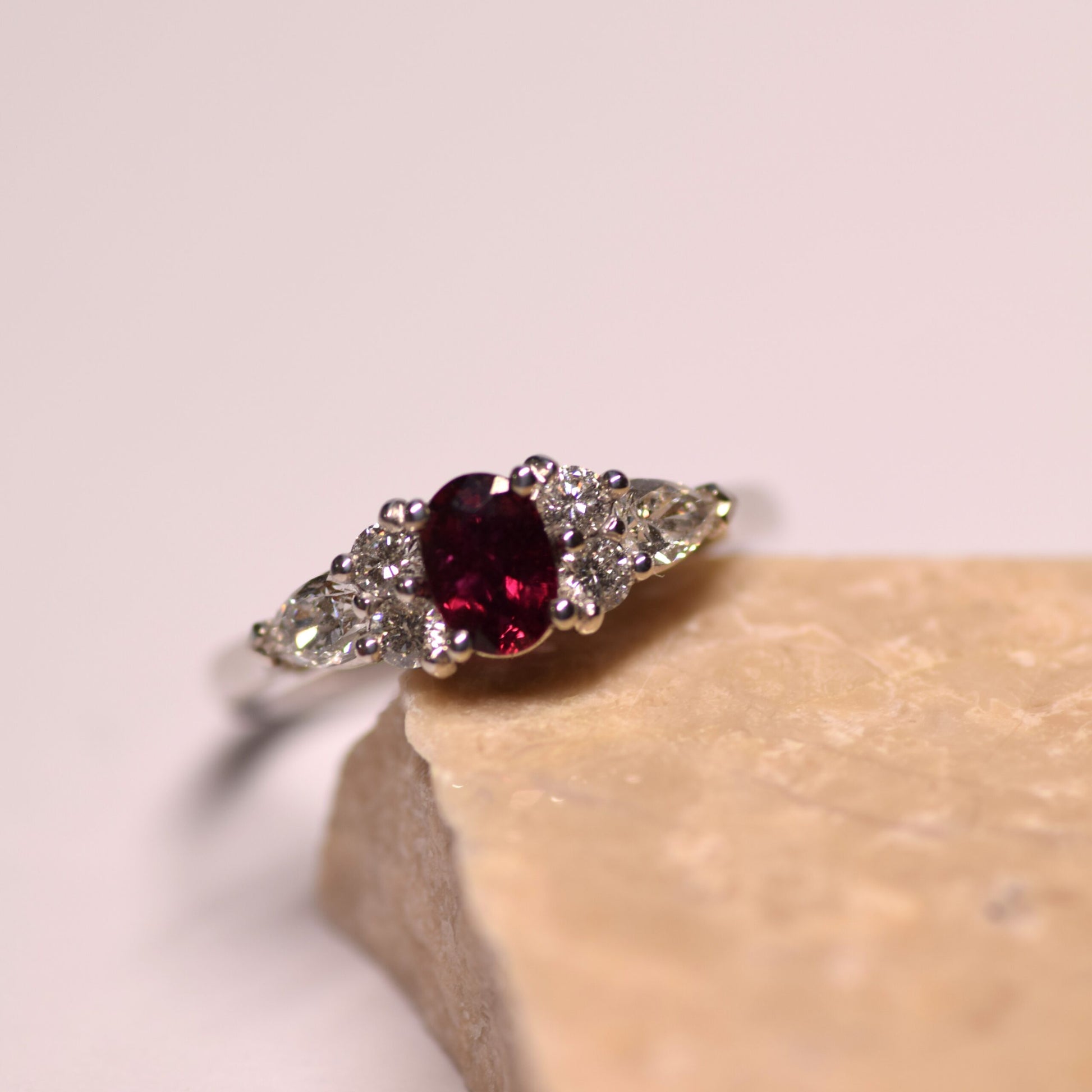 Ruby with round diamond and pear cut diamond ring