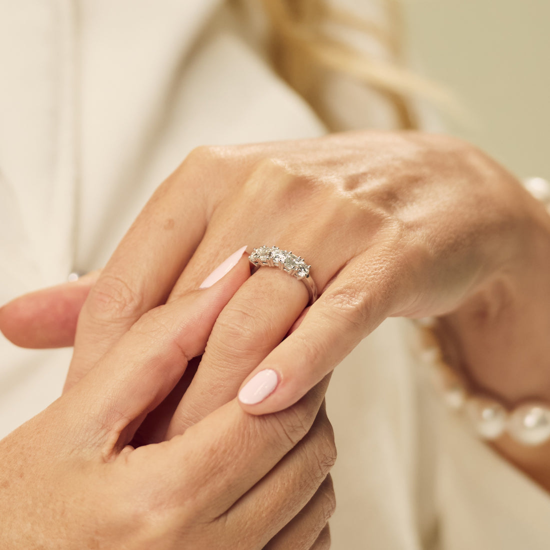 Emerald & Round Cut Five Stone