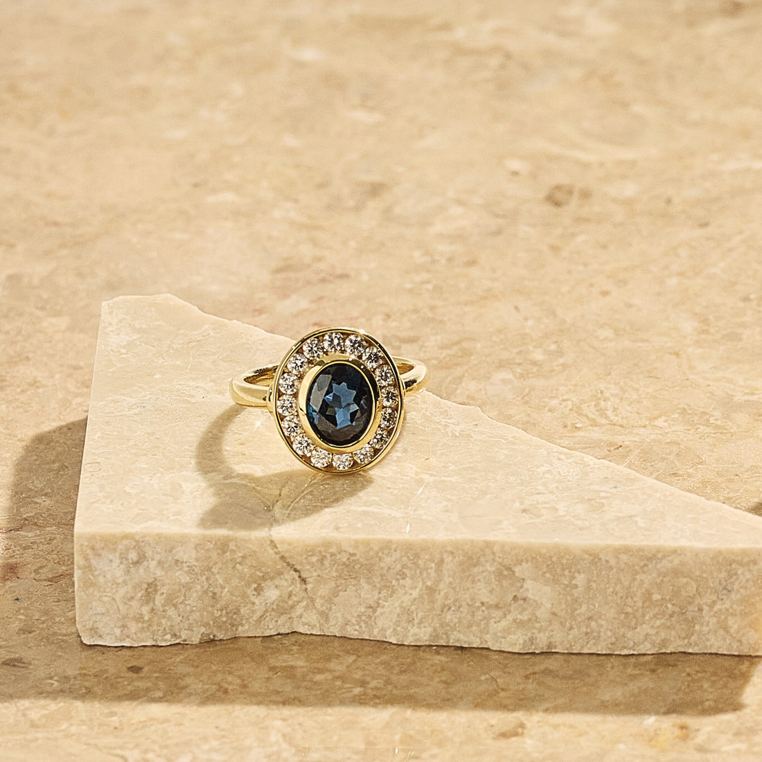 Australian Sapphire Oval Cut Bezel Halo Ring
