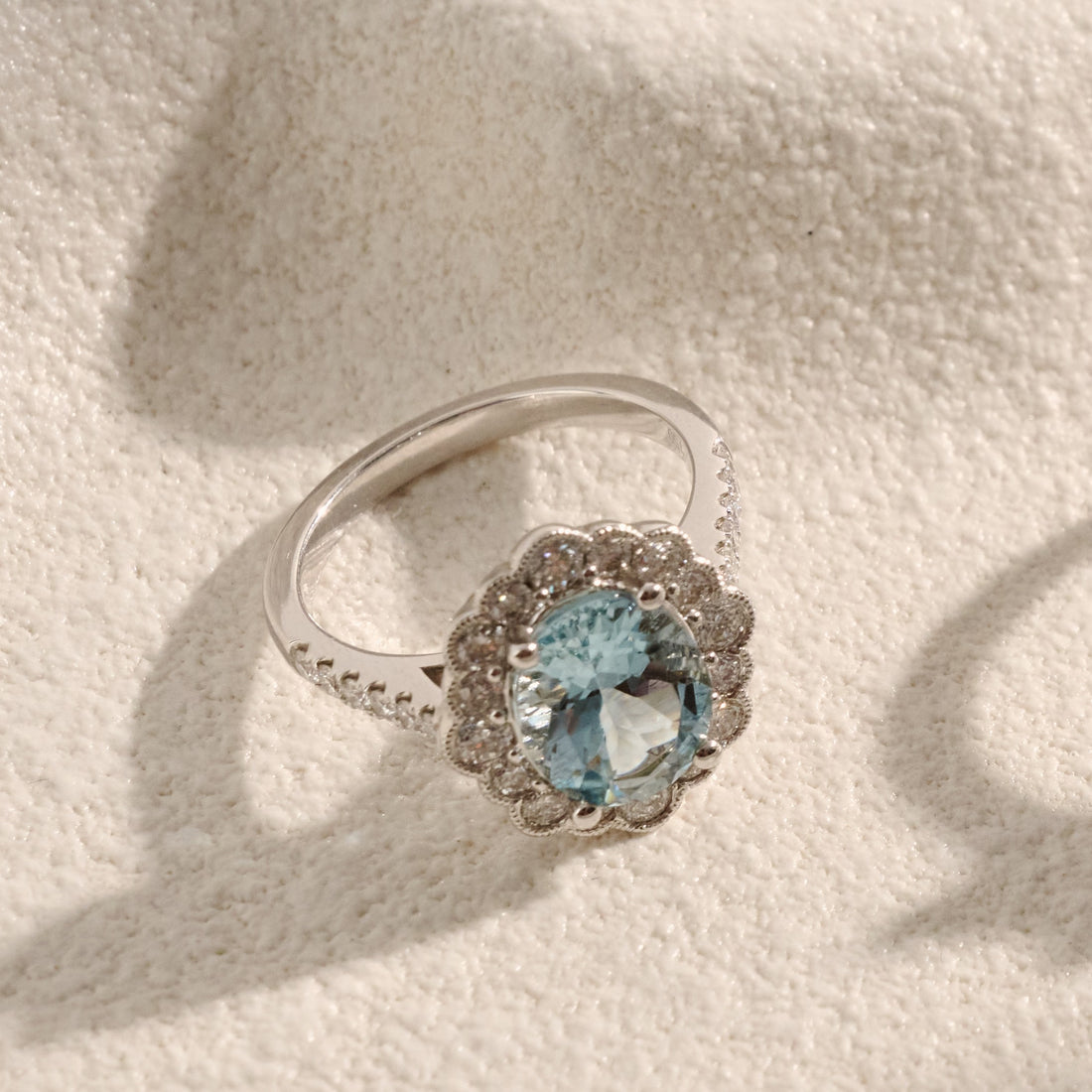 Aquamarine and Flower Style Diamond Halo