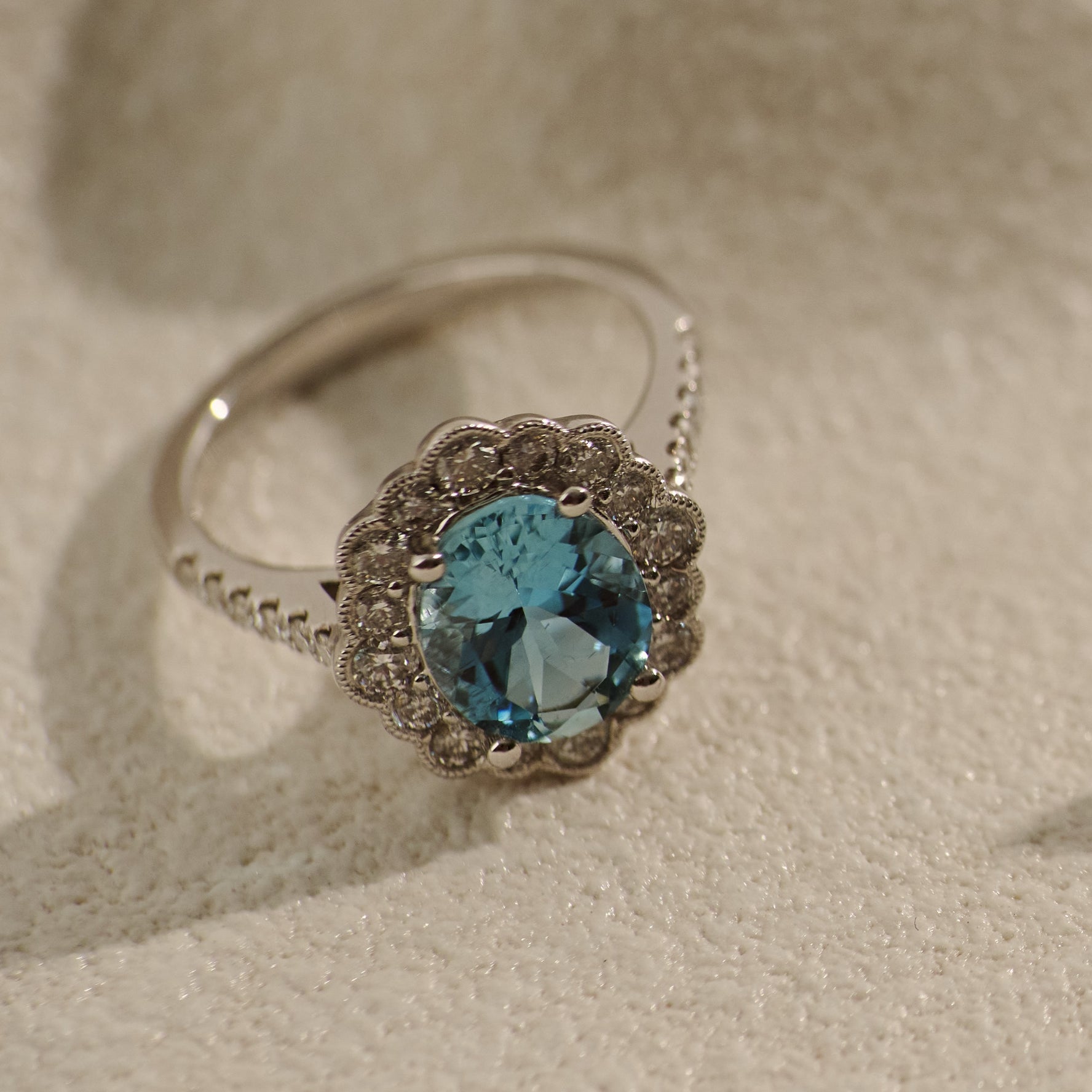 2.36ct Aquamarine and Flower Style Diamond Halo